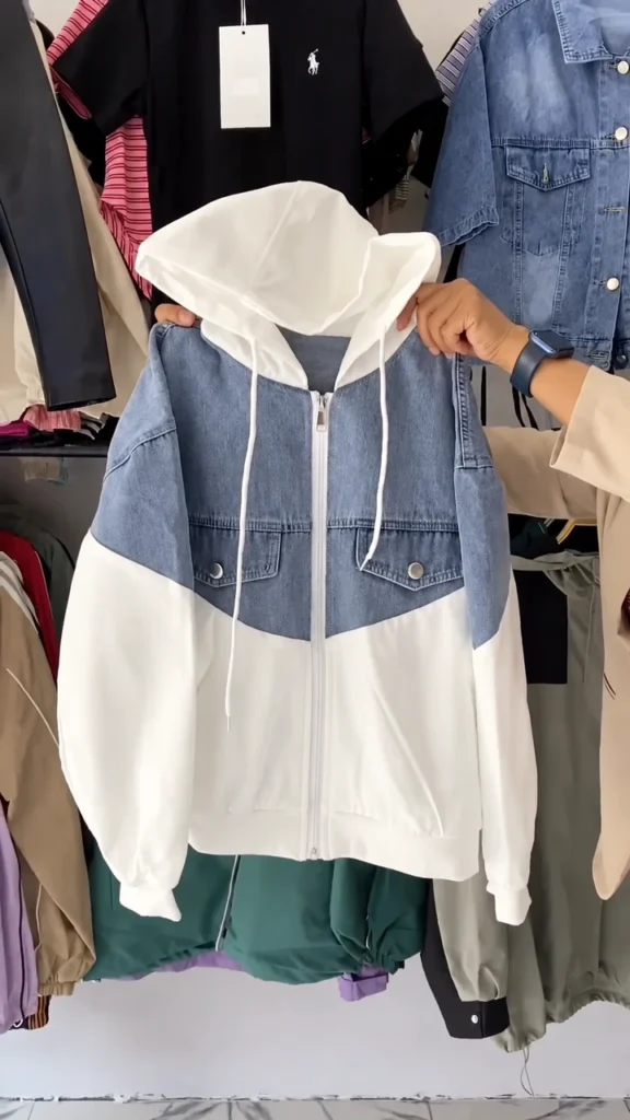 A white hooded top in a regular fit