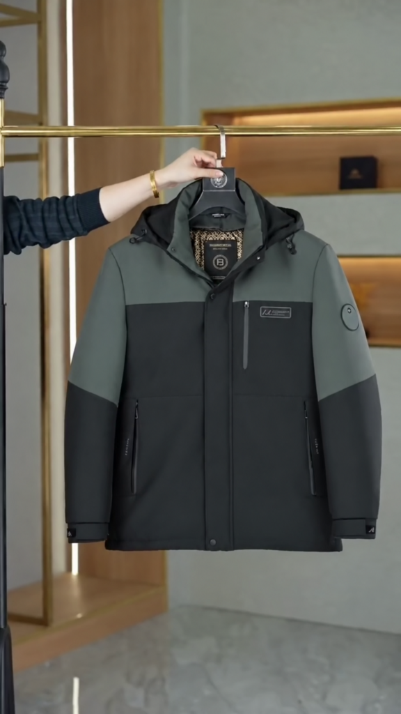 A hooded winter parka with a zip front and insulated lining