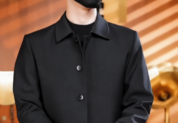 A slim-fit long trench coat with a notched collar