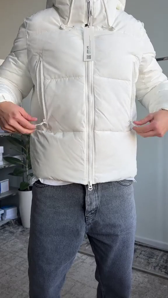 A white hooded puffer jacket in a regular fit