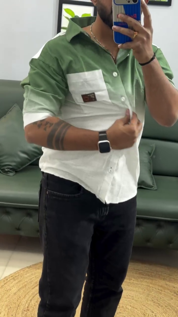 A green and white spread-collar shirt with a patch pocket