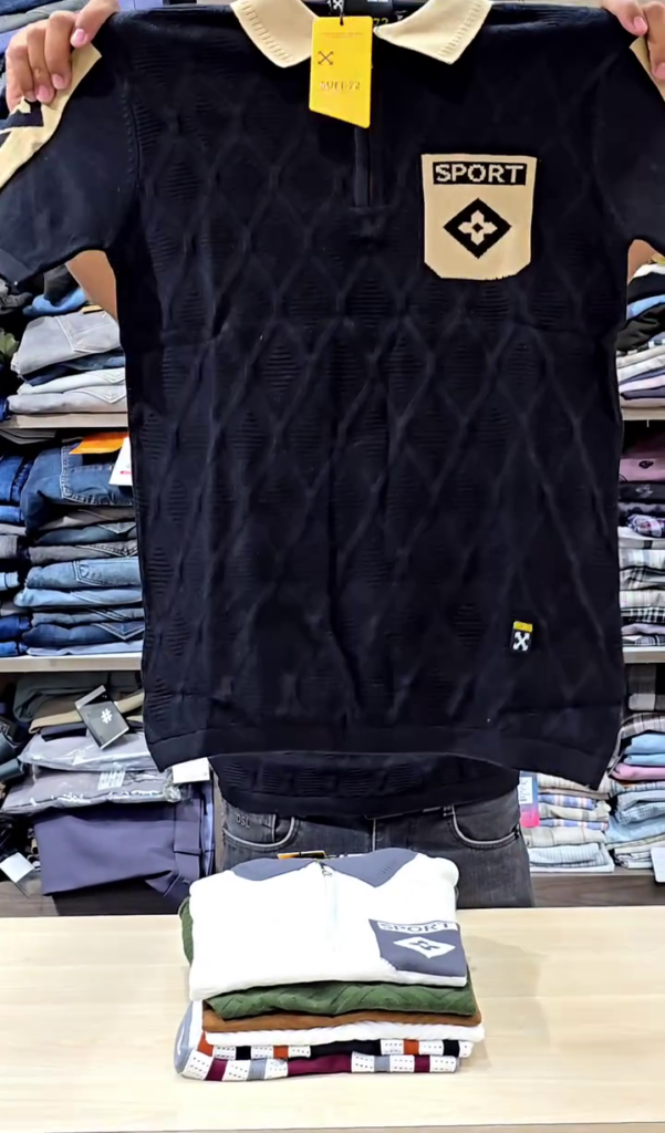 A navy knitted polo with a quarter zip