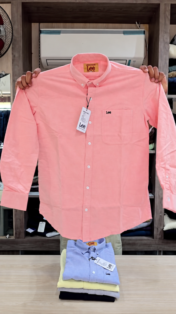 A plain solid shirt with a minimal style