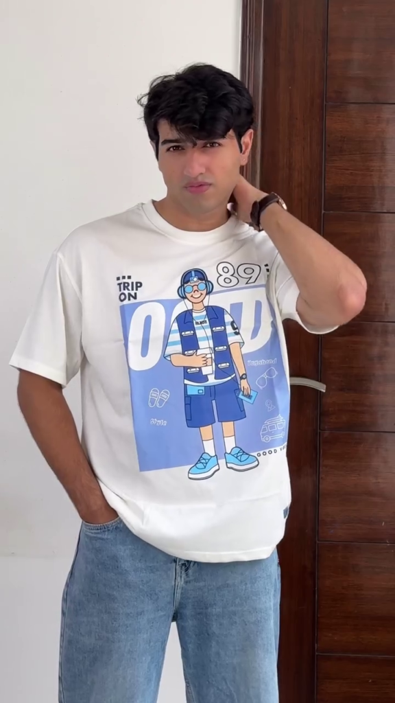 An off-white graphic tee with three-quarter drop-shoulder sleeves